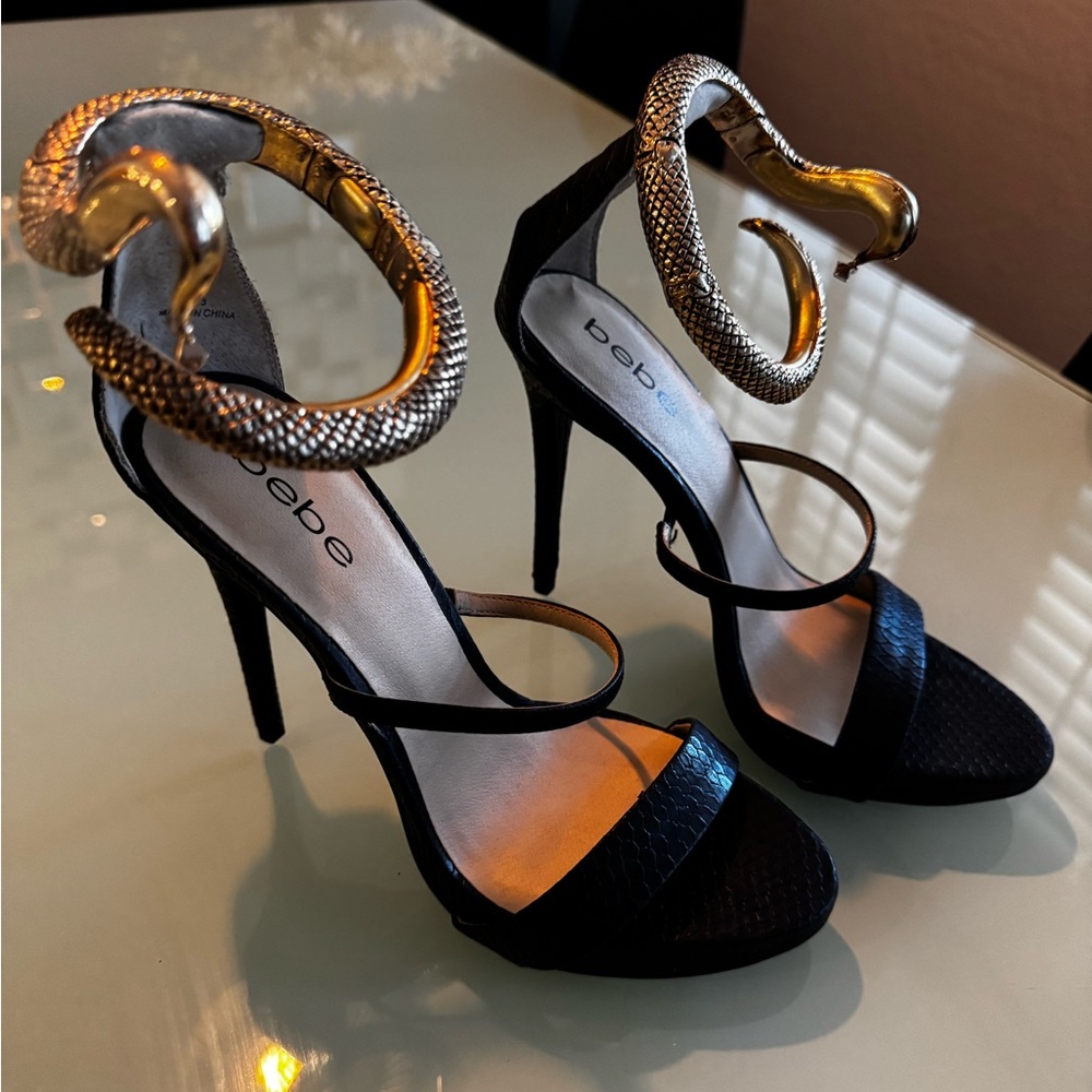 Bebe Black and Gold Strappy Heels with Stiletto